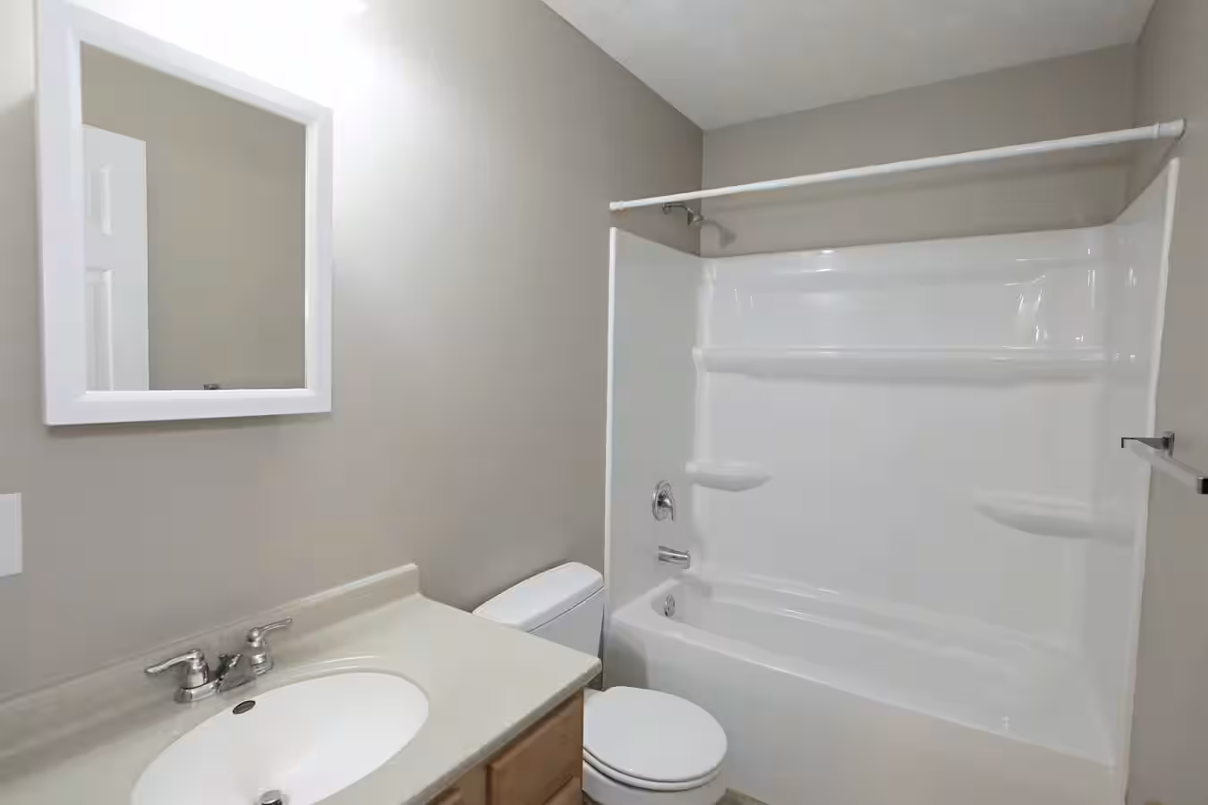 Bathroom with a full tub and shower